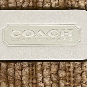 Coach Leather Double Sided Embossed + the gold stamped Curved Zip Bag Tag